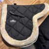 Full black numnah with faux fur